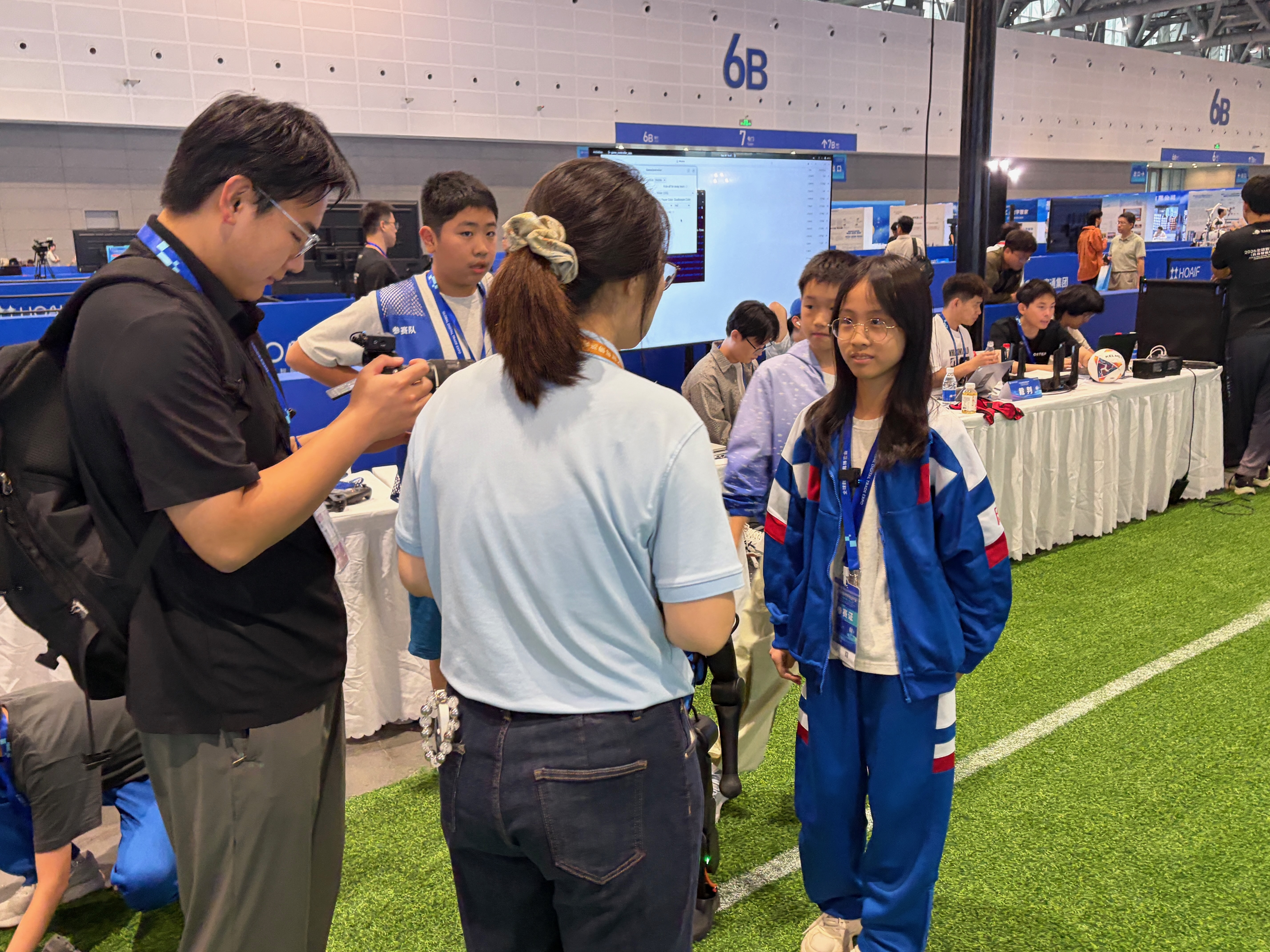 Students being interviewed before the match